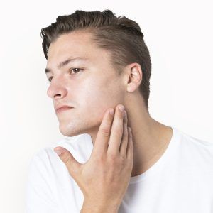 Handsome man candid portrait for skincare photoshoot